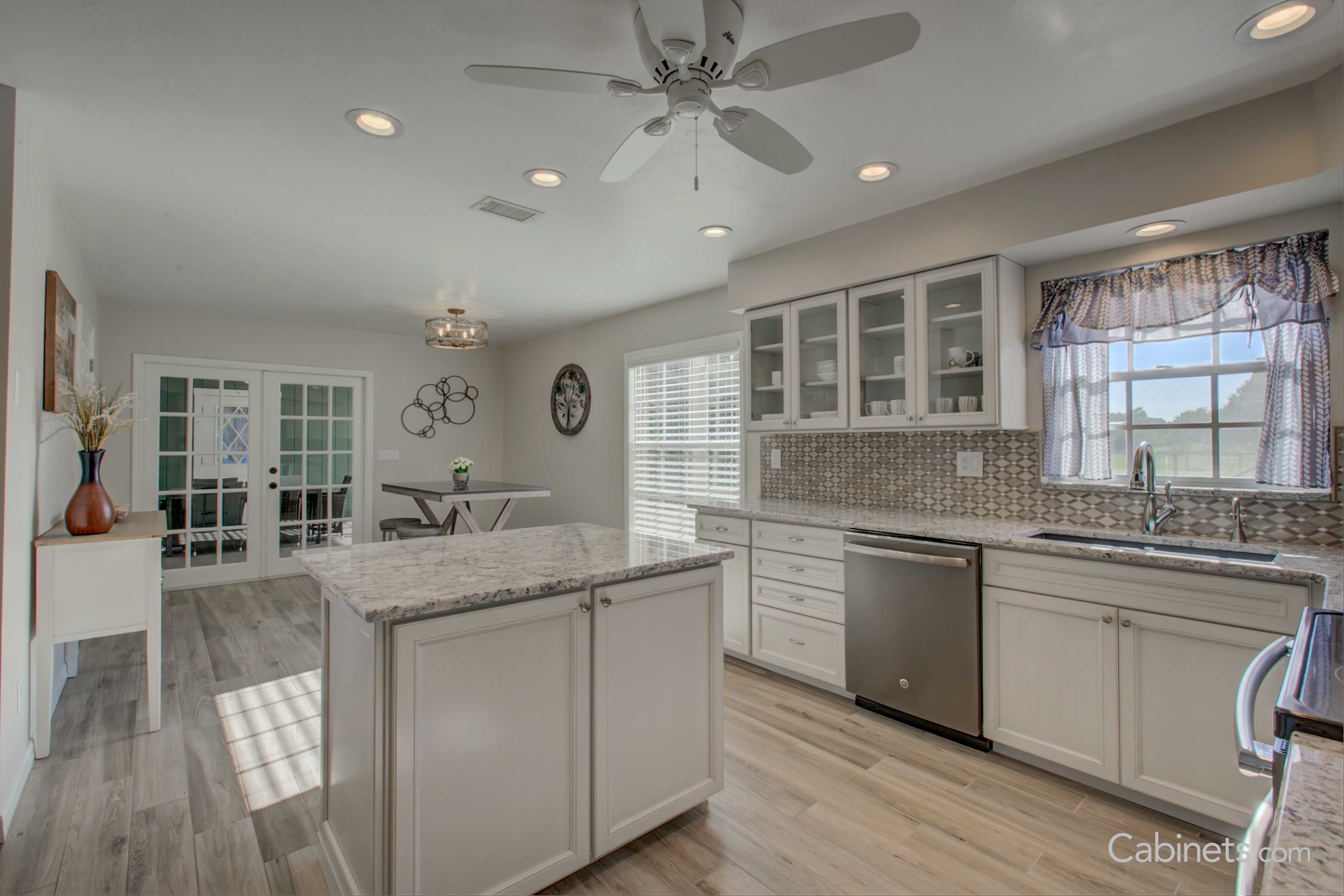 Belleair Maple Bright White Cabinets with Light Gray Walls