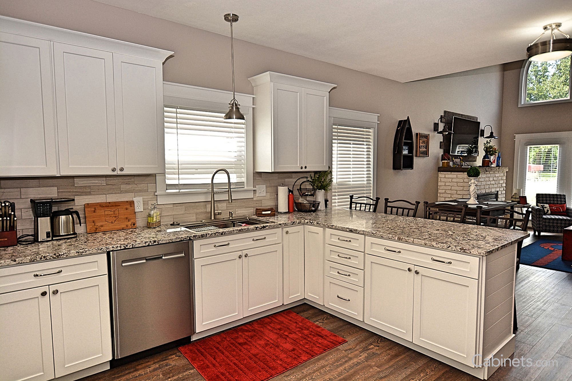 Open space with Colonial II Maple Bright White cabinetry