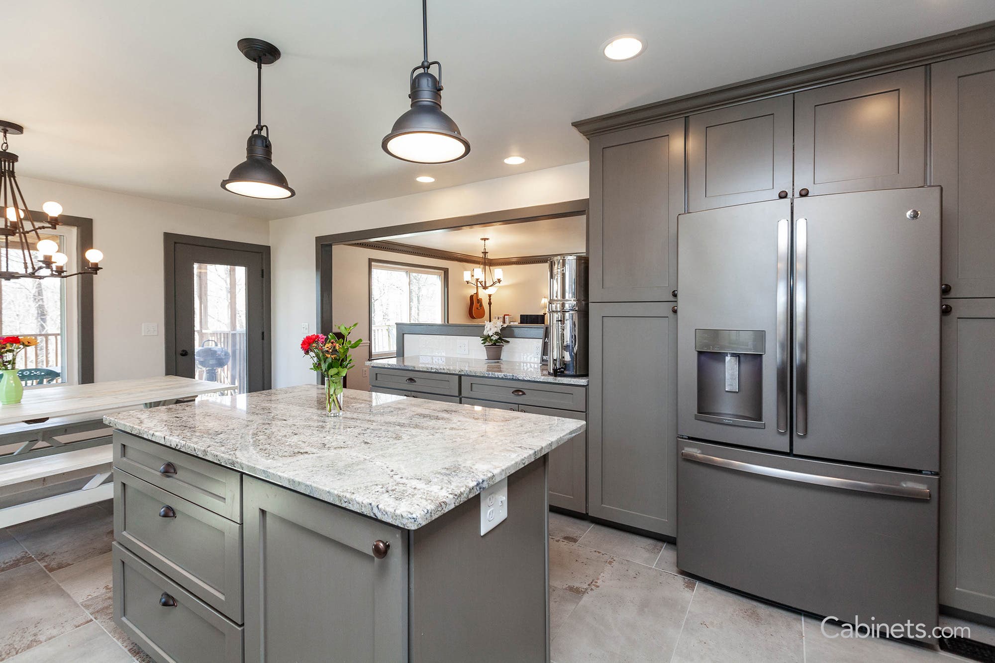 Shaker II Maple Creek Stone Brushed Brown Glaze with matte refrigerator, island, and overhead lighting