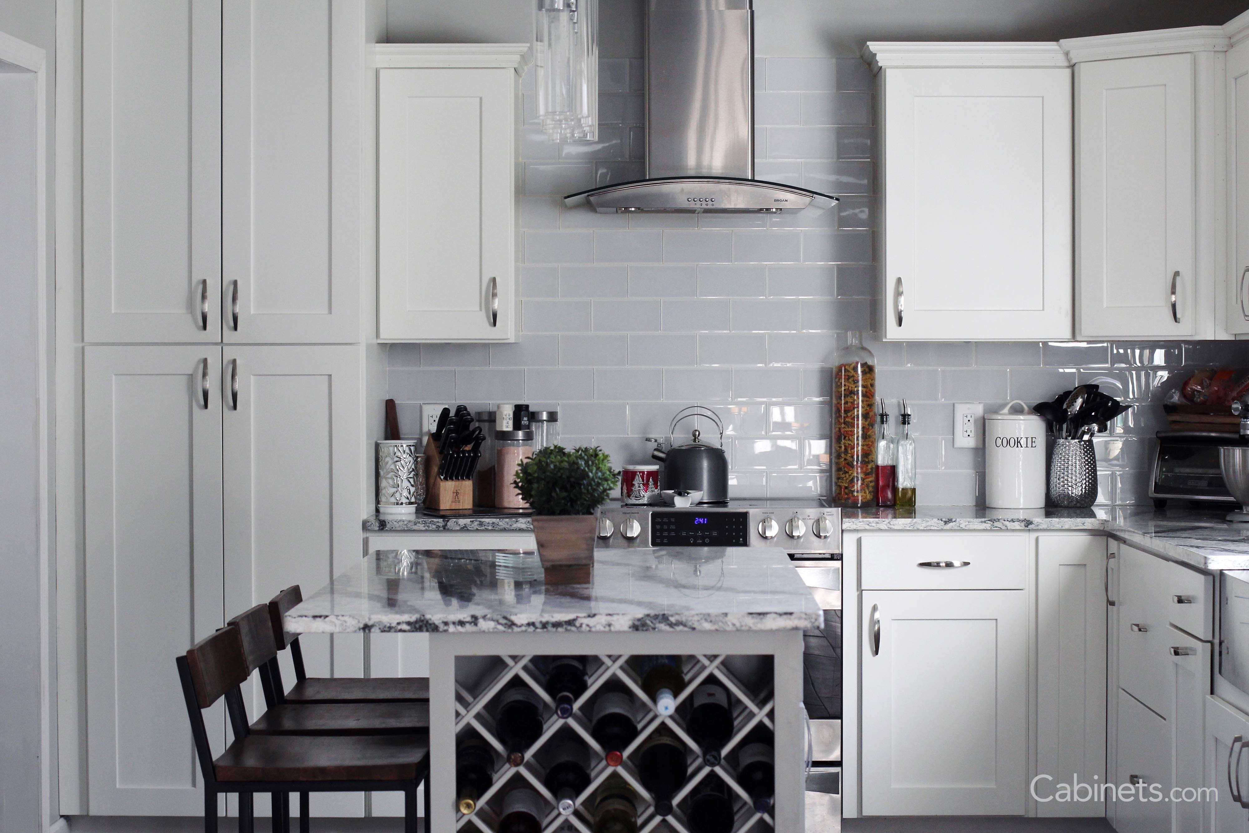 Tile backsplash and wine rack in a Shaker Maple Bright White kitchen