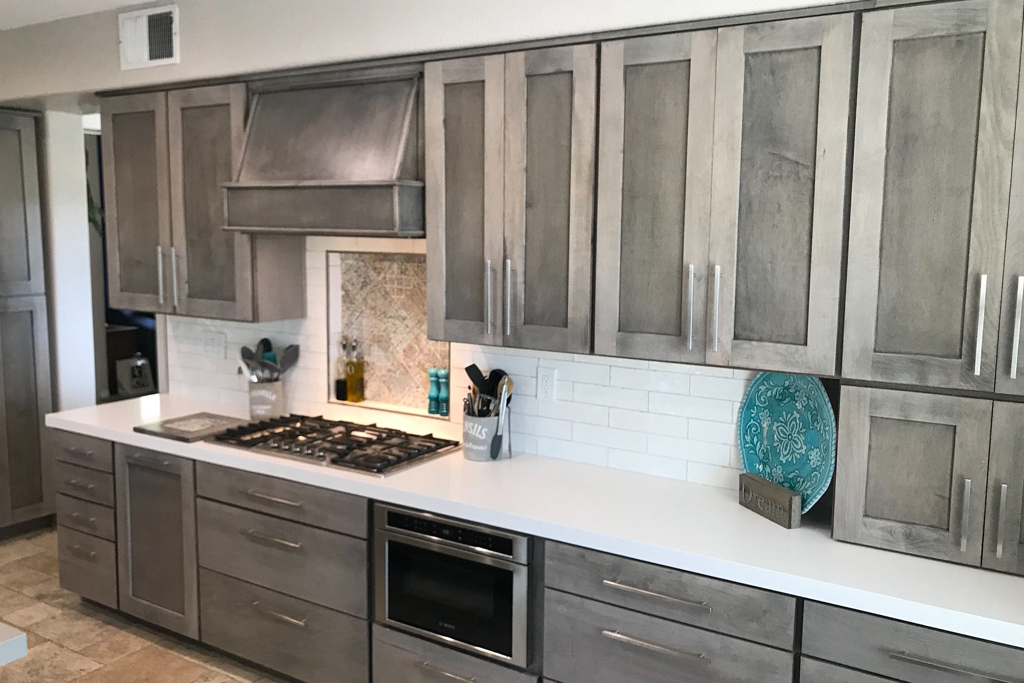 Shaker Maple Storm cabinets installed in a customer's home