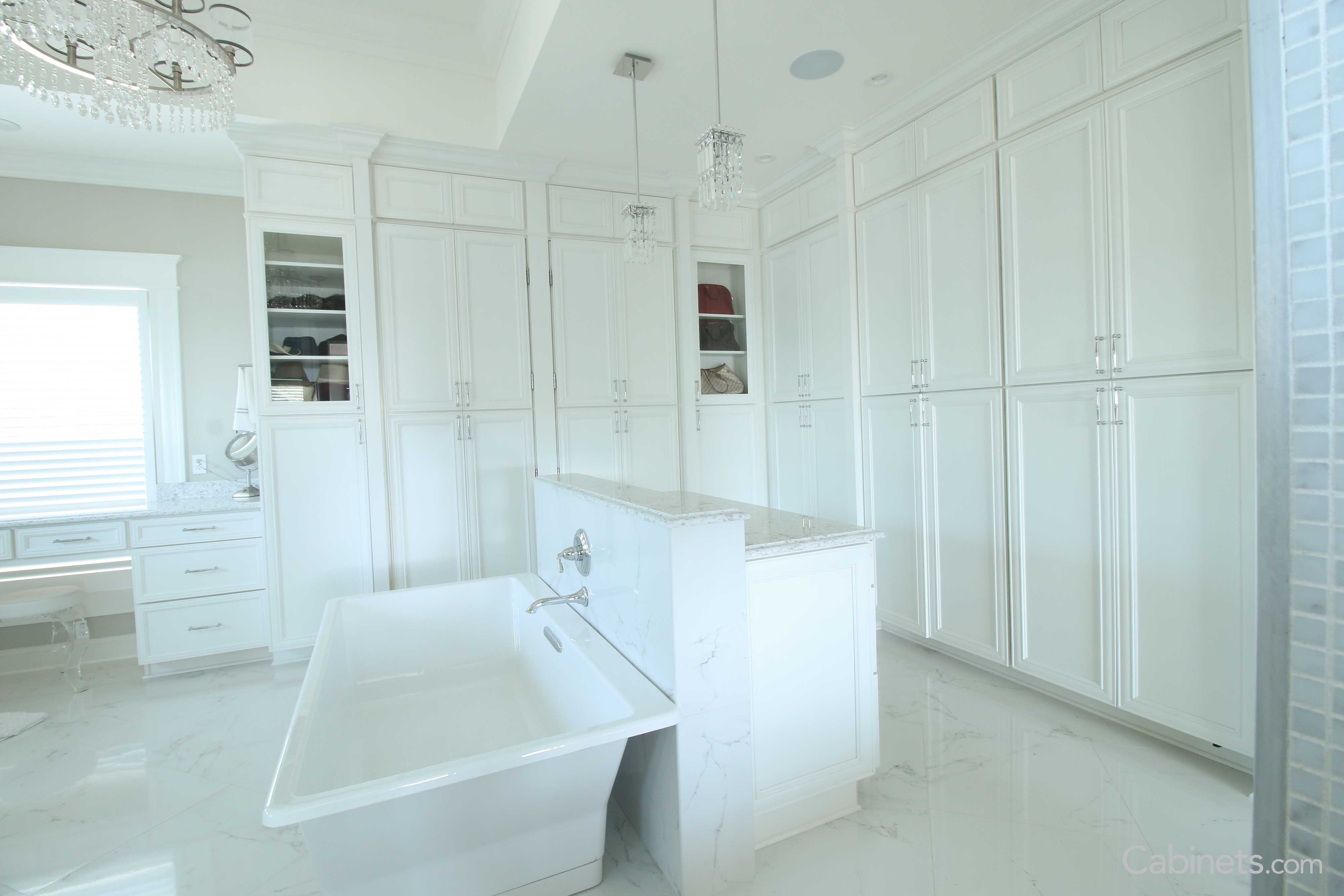 Elegant bathroom with Springfield Maple Alabaster tall cabinets