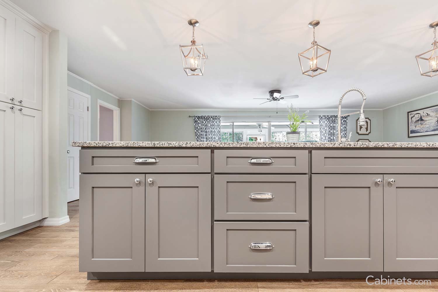 Beautiful cabinet knobs and cups in Shaker Maple Creek stone Cabinets