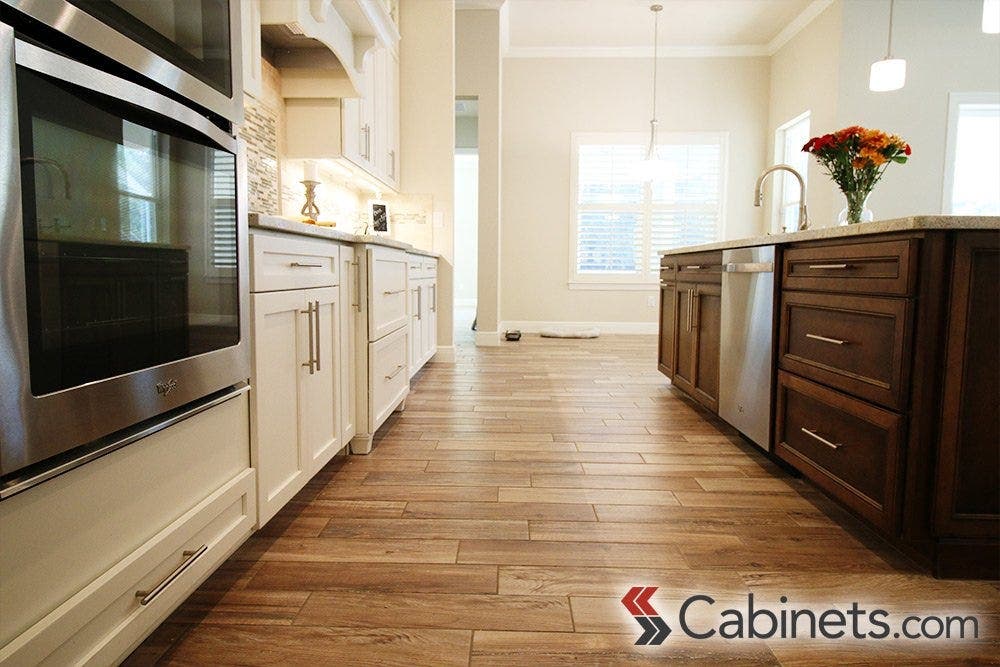 Not only is this kitchen beautiful, it is very functional thanks to a few custom options such as Roll Out Trays, a Tip-Out Tray, and Trash Can Pull Outs.