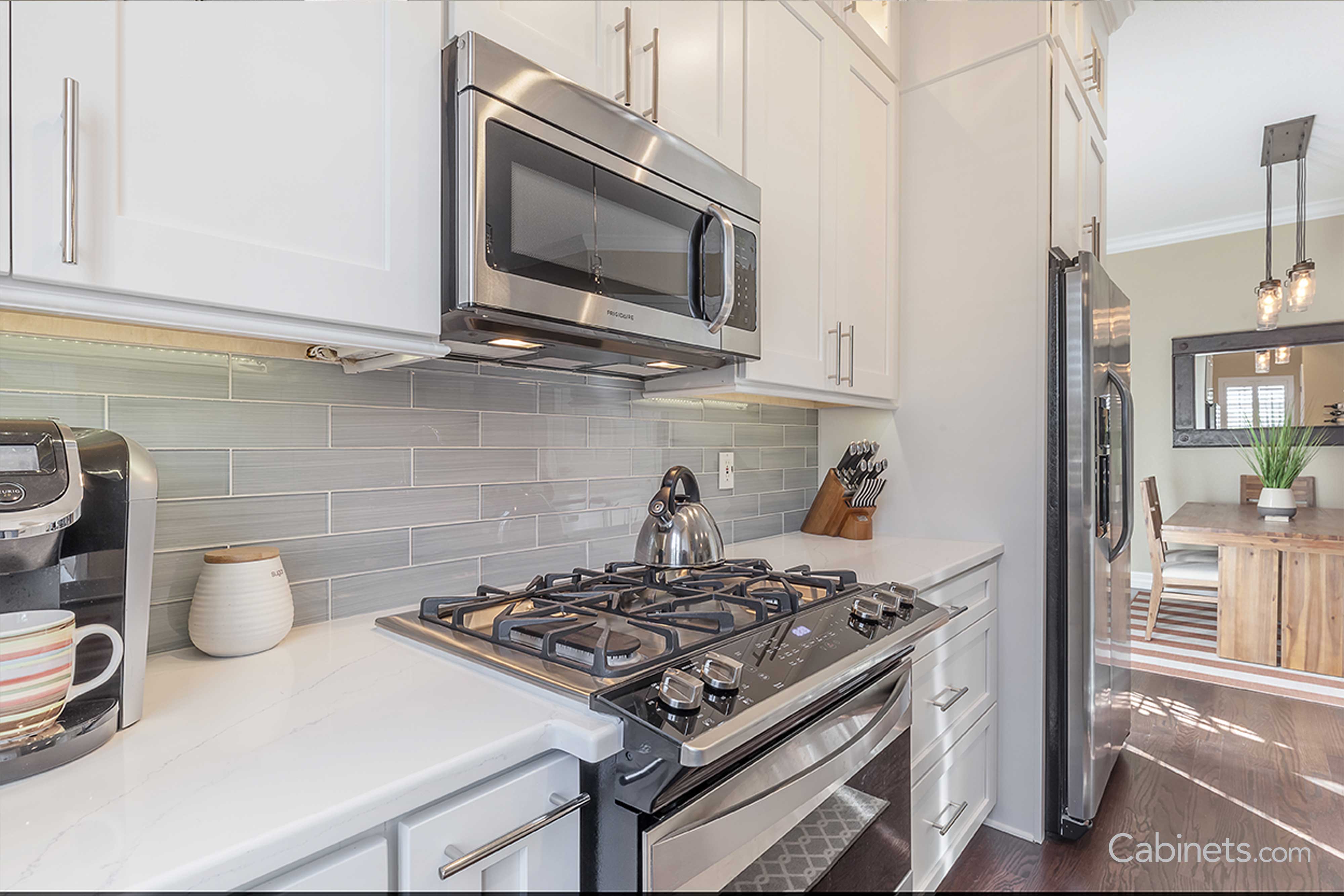 Shaker white cabinets with silver appliances