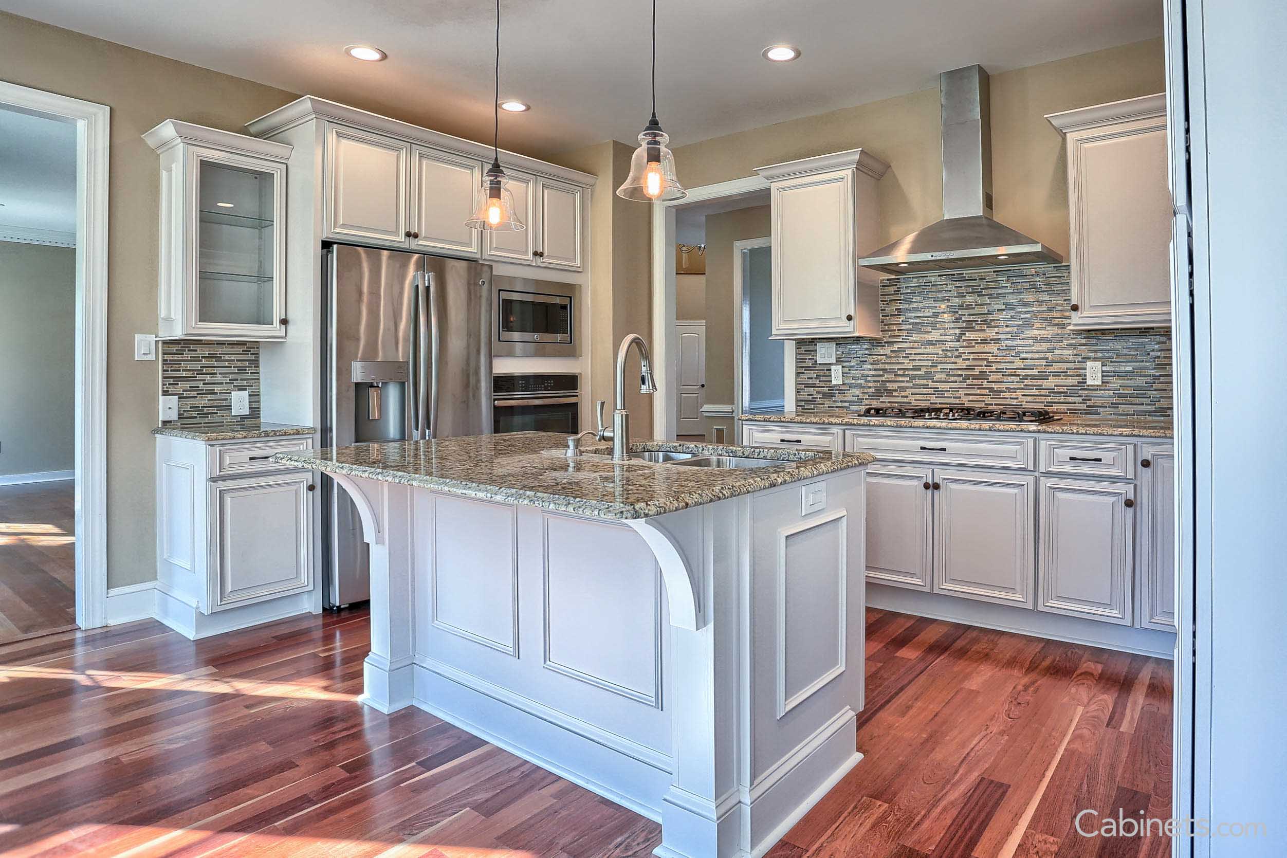 White island with granite countertops and corbels