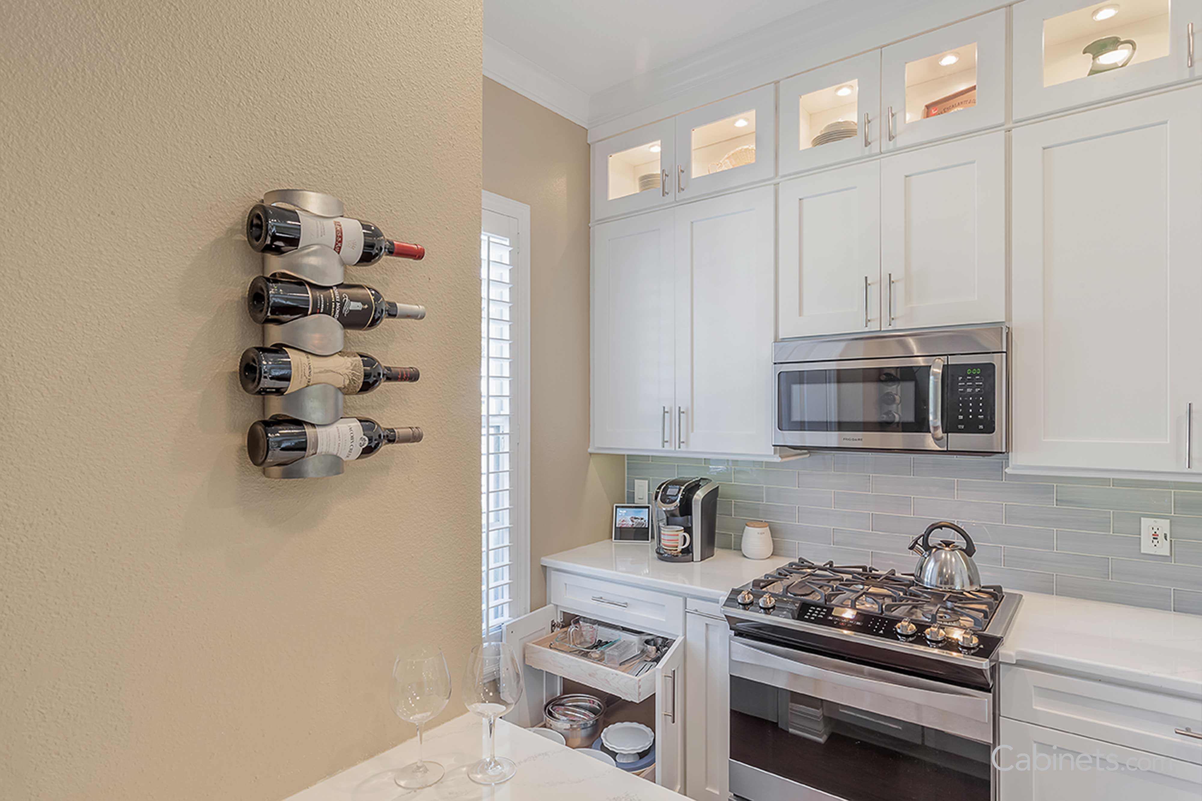 Shaker white stacked cabinets with glass fronts 