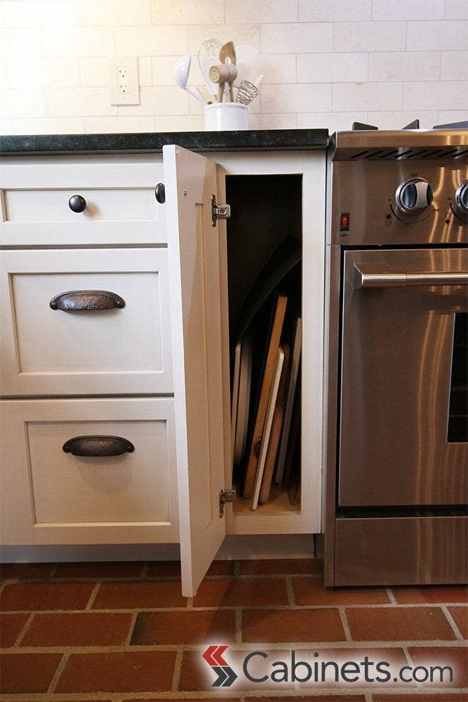 A great area for storing cookie sheets, cutting boards, and baking trays!