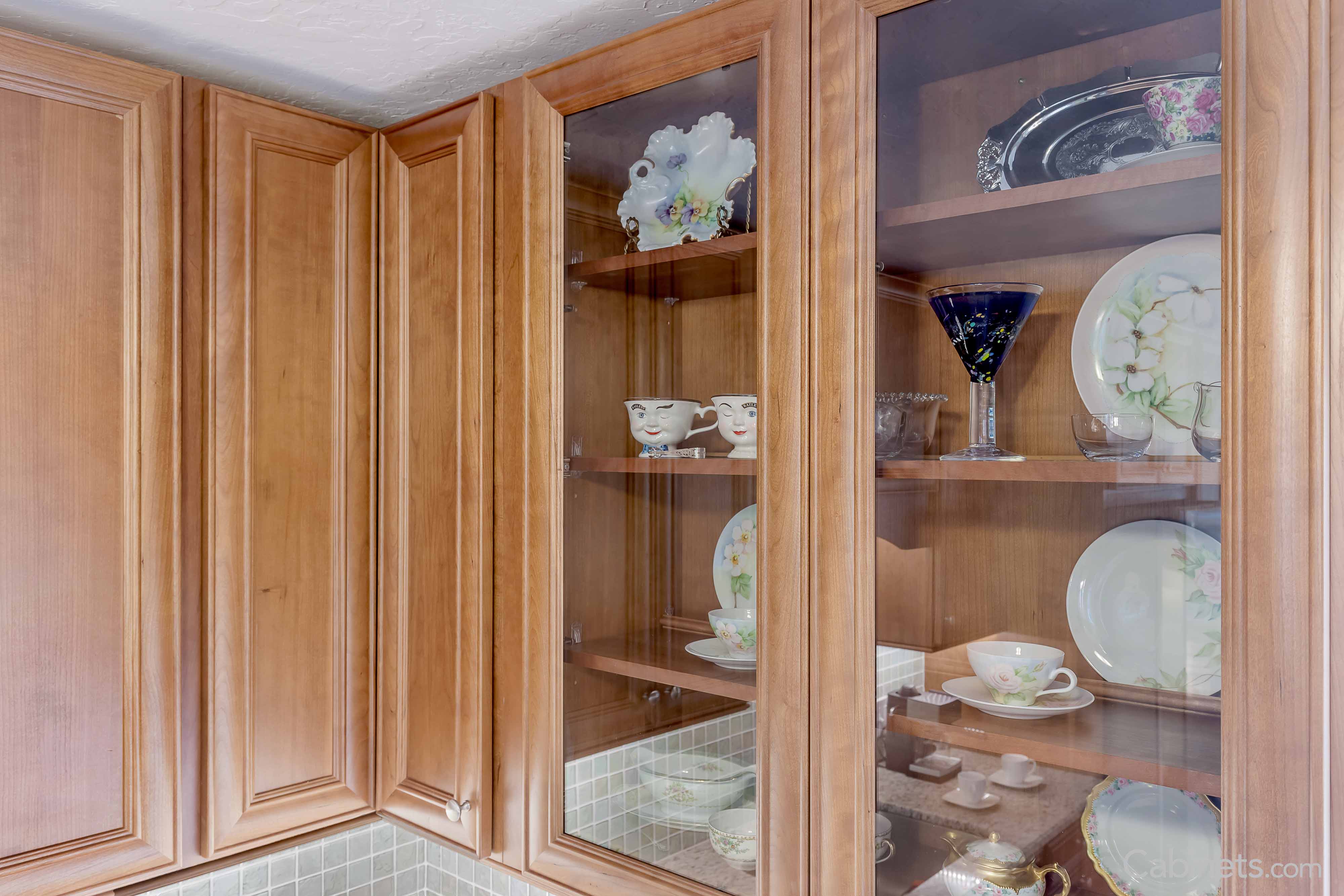 Maple toffee cofee glaze cabinets with glass fronts