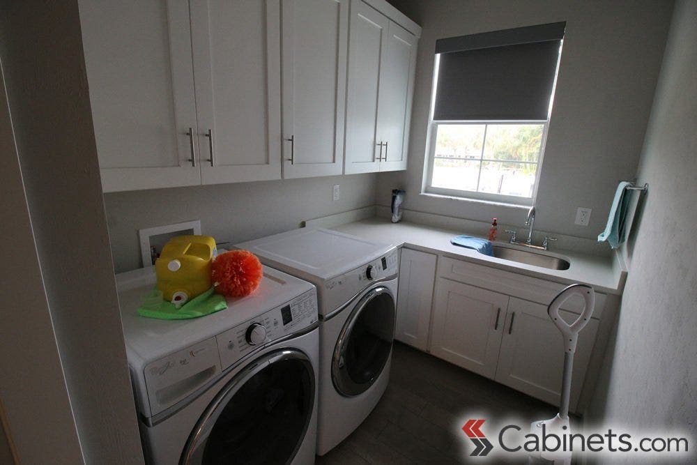 These Shaker Maple Bright White cabinets look bright and clean in a mudroom!