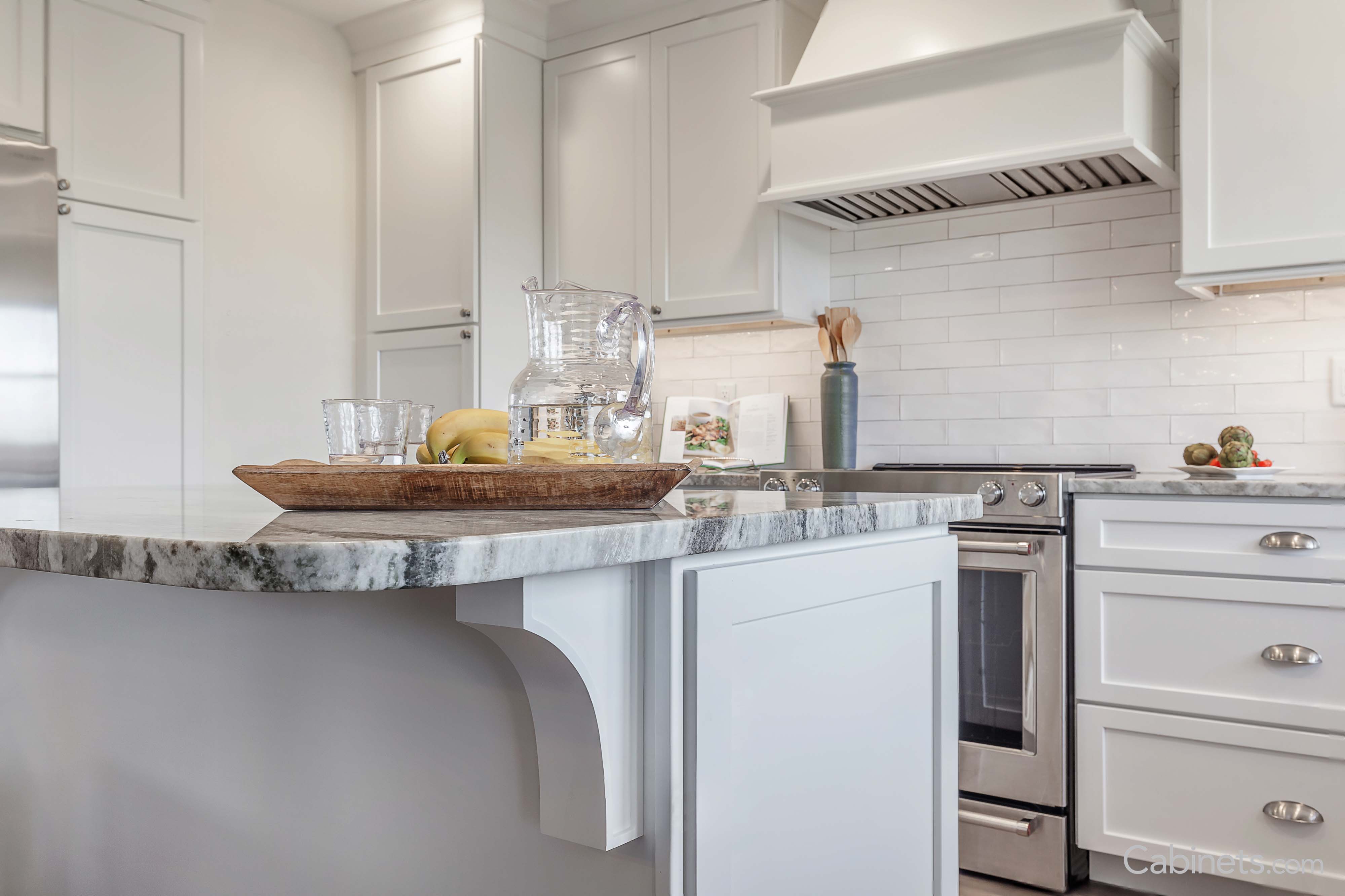 White kitchen featuring wood accessories 