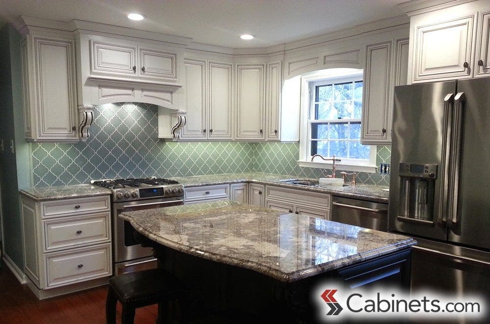 This kitchen showcases so many great details including great moulding and a Chocolate Glaze over the Bright White finish.