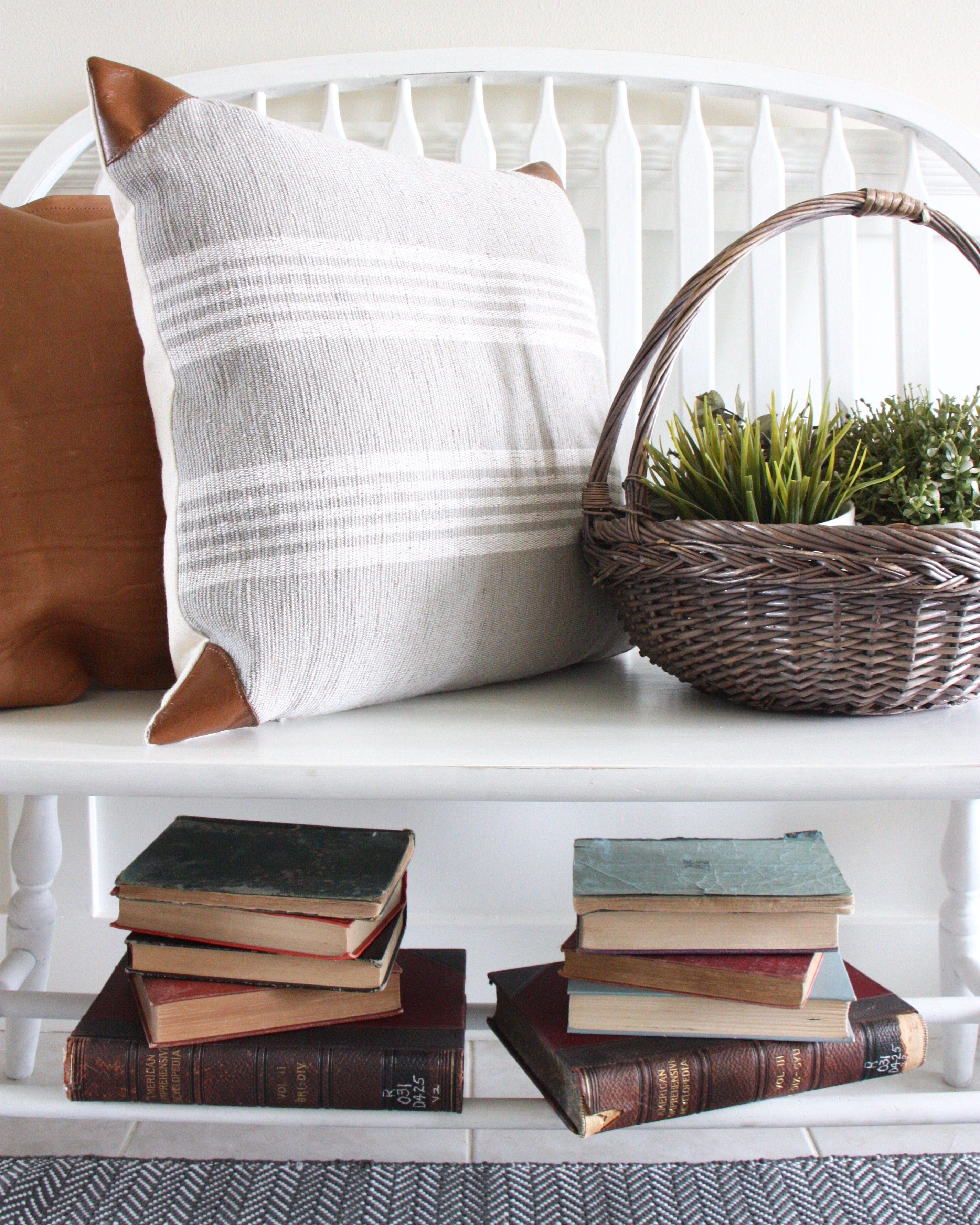 White bench with farmhouse decor